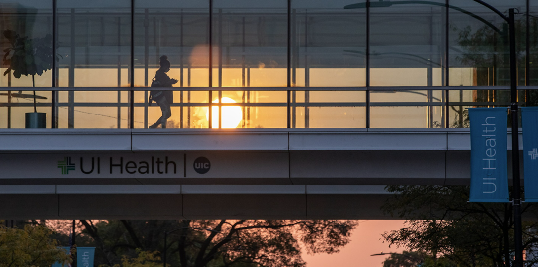 UI Health Taylor St walkway at sunset