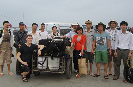 Professor Brian Murphy in a group photo with his partners in Vietnam