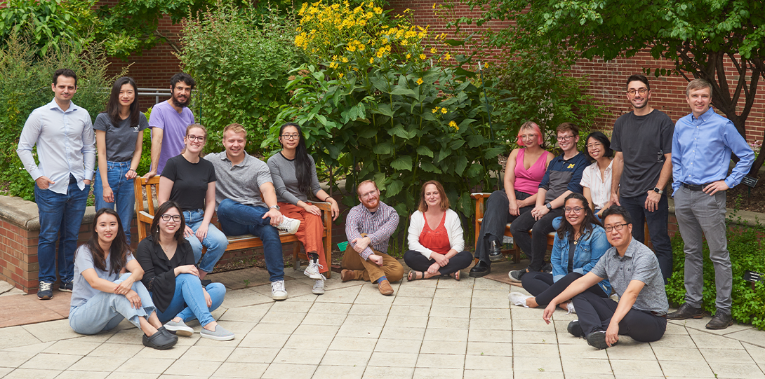group of PSCI students and professors in the Atkins garden